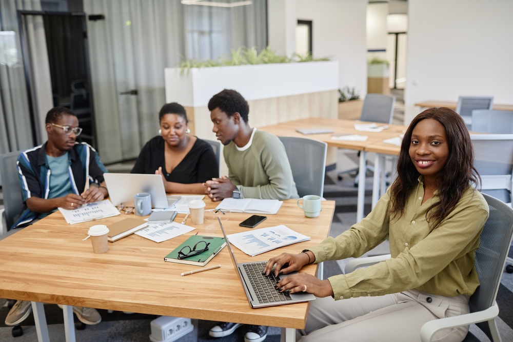 Black Businesswoman Typing on Laptop